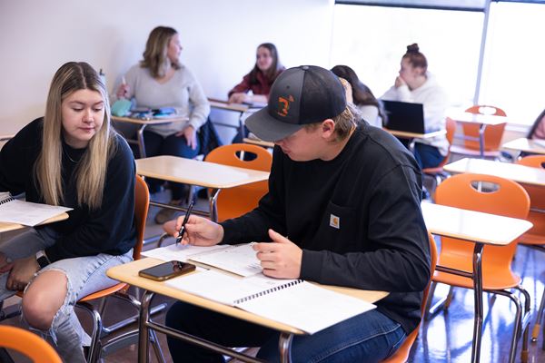 Business students in classroom. 