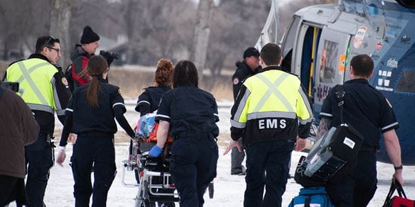 Paramedic students approach HALO air ambulance as part of training scenario