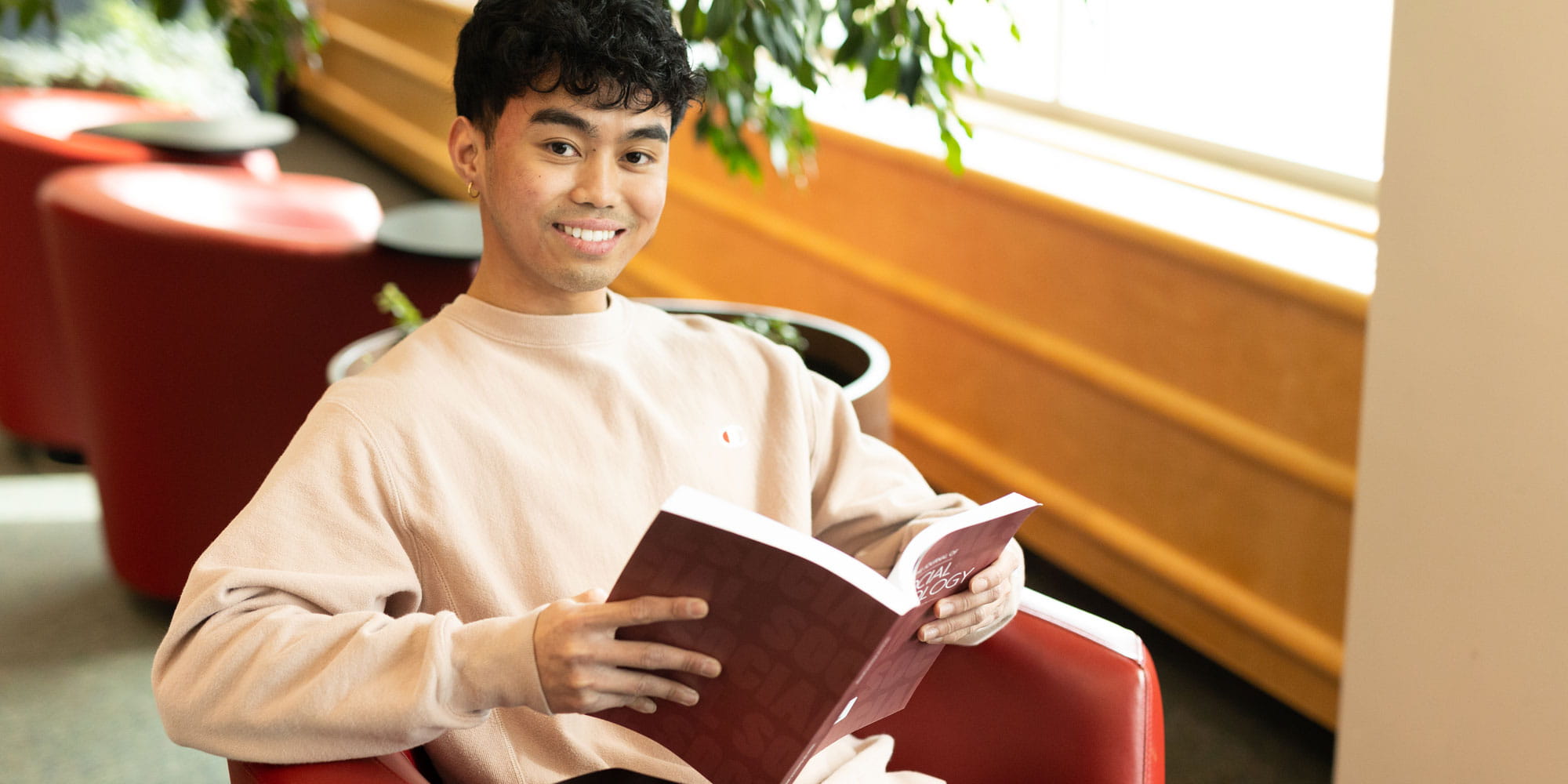 Student studying in the Vera Bracken Library